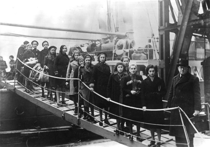 A group of Polish Jewish refugee children standing on a ship's gangway in London