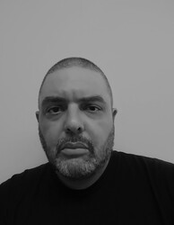 Black-and-white photo portrait of Shane McCrae