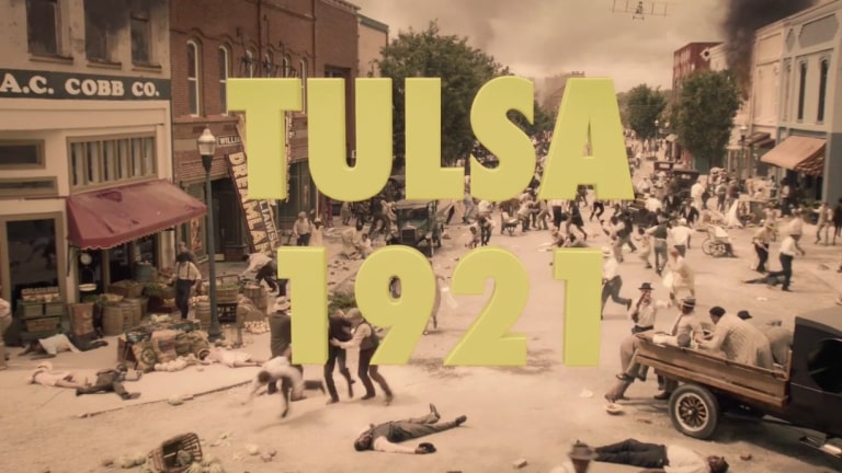 Screenshot from Watchmen featuring the words Tulsa 1921