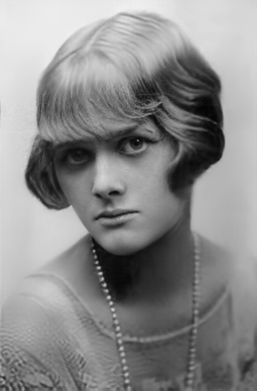Black-and-white restored photo portrait of Daphne du Maurier in her youth